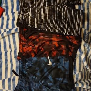 Boys Nike dry fit athletic shorts blue ,red,and black and white.size 6m.